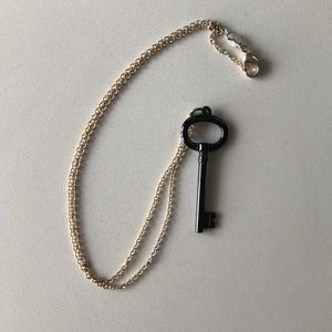 Tiffany’s gold and Slate key necklace